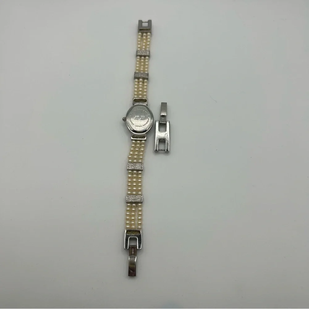 Avon VTG Faux Pearl Band Women's Silver Tone Oval Watch - With New Battery